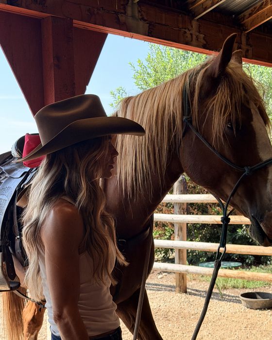 Spring B outdoors with a horse